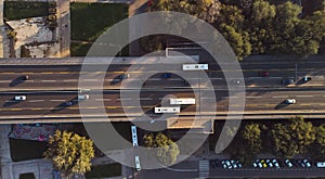 Aerial view of the road bridge across the Sava river. Belgrade. Road on the bridge with moving cars view down.