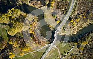 Aerial view of road in forest.