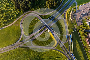 aerial view of road interchange or highway intersection. Junction network of transportation taken by drone