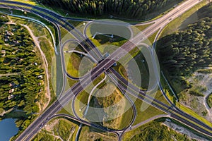 aerial view of road interchange or highway intersection. Junction network of transportation taken by drone