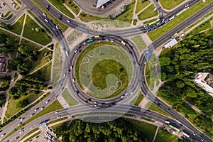aerial view of road interchange or highway intersection. Junction network of transportation taken by drone