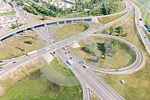 Aerial view of road interchange or highway intersection urban traffic