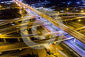 Aerial view of road interchange at night