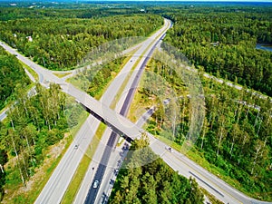 Aerial view of road interchange surrounded by forest in Finland, Northern Europe