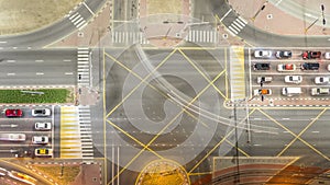 Aerial view of a road intersection in a big city night timelapse.