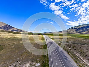 Aerial view of the road leading to Dogubayazit from Igdir. Plateau around Mount Ararat, mountains and hills. Eastern Turkey