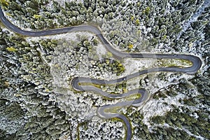 Aerial view of road path on mountain cliff