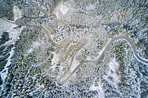 Aerial view of road path on mountain cliff