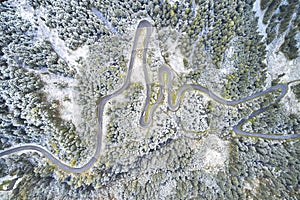 Aerial view of road path on mountain cliff