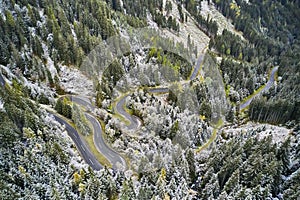 Aerial view of road path on mountain cliff