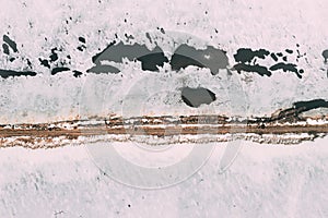 Aerial View Of Road Through Ponds In Winter Snowy Landscape. Frozen Ponds Of Fisheries In South Of Belarus. Top View Of