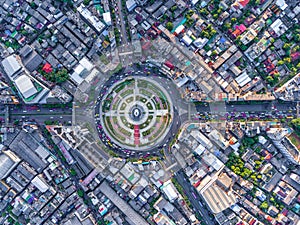 Aerial view Road roundabout with car lots Wongwian Yai in Bangkok,Thailand.street large beautiful downtown at night.cityscape.