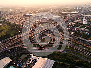 Aerial view Road roundabout. Expressway with car lots in the cit