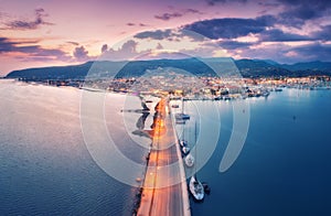 Aerial view of road and sea at night in Lefkada island, Greece