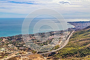 Aerial view of the road and the suburbs of Benalmadena, Andalusia province, Spain