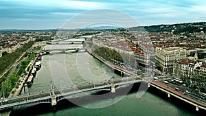 Aerial view of road traffic on bridges and the embankment of the River Rhone in Lyon, France