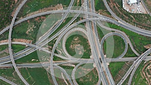 Aerial view. Road traffic highway and overpass with cars and trucks, interchange, two-level road junction in the big