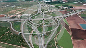 Aerial view. Road traffic highway and overpass with cars and trucks, interchange, two-level road junction in the big