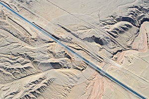 Aerial view of road on wind erosion terrain in qinghai