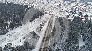 Aerial view of a road in winter landscape