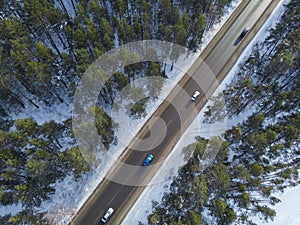 Aerial view of a road in winter landscape