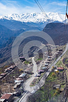 Aerial View of Roads, Snowy Mountains and Villages at Wings of Tatev, Armenia