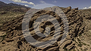 Aerial view of rock formation called Los Colorados, near Cafayate city, Salta province, Argentina. Part of Quebrada de las Conchas