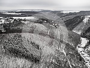 aerial view rock with medieval castle Ehrenburg near moselle river Brodenbach white winter snow wonderland forest hills