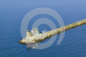 Aerial view of Rockland Lighthouse at end of jetty from the Samoset Resort, Maine photo