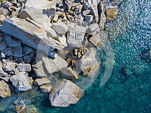 Aerial view of rocks on the sea. Overview of the seabed seen from above