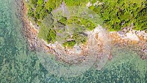 Aerial view of the rocky coast near the blue lagoon of Port Dickson, Malaysia