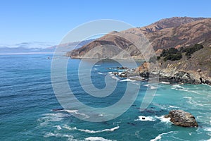 Aerial view of the rocky coastline along the Pacific Ocean on the California coast near Big Sur