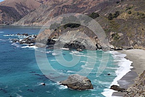 Aerial view of the rocky coastline along the Pacific Ocean on the California coast near Big Sur