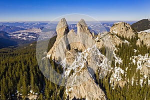 Aerial view of rocky mountain top in winter