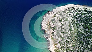 Aerial view of rocky shore along Mediterranean Sea at Mersin. Drone footage showcases calm waters of Mediterranean Sea