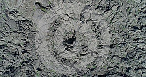 Aerial view of rocky volcano's feet. Extreme life condition. Hot temperature, no human life.