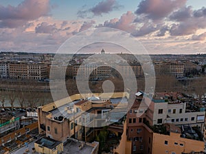 Aerial View of Rome at Dawn with Tiber River and St. Peter's Basilica Silhouette