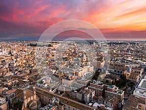 Aerial View of Rome at Dusk Warm Sunset Hues Over Historic Cityscape