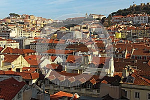 Aerial view from the roof top to the red tiled roofs of the historic part of city Lisbon. Travel and tourism concept. Portugal