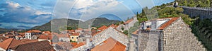 Aerial view with the roofs of old houses from the small town of Ston and medieval fortifications. Dubrovnik area, Croatia