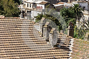 Aerial view of rooftop chimneys.
