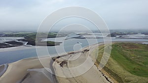 Aerial view of Rossnowlagh Beach in County Donegal, Ireland with the Donegal Town Waterbus in the background