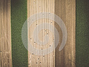 Aerial view of round hay bales on stubble