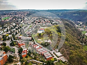 Aerial view of row houses and old funcionalism architecture in background in residential area of Baba in Prague 6, Czech republic