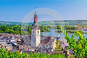 Aerial view of Rudesheim am Rhein historical town centre with clock tower spire of St. Jakobus catholic church
