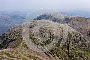 Aerial view of rugged, mountainous scenery Scafell Pike and Great End, Lake District, England