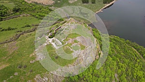 Aerial view of Ruins of ancient Vishegrad Fortress on the southern coast of Studen Kladenets reservoir, Kardzhali, Bul