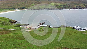 Aerial view of the ruins of Lenan harbour at the north coast of County Donegal, Ireland.