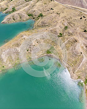 Aerial view of rural and agricultural areas south of Lokman in the province of Adiyaman, Turkey. Inlets on the Euphrates river photo