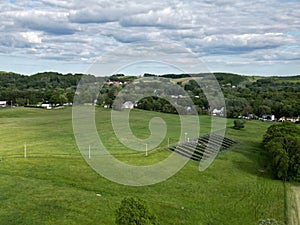 Aerial view of rural agricultural landscape with multiple farm buildings, Rogers Farm Haverhill, Ma